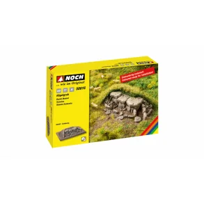 58616 NOCH. Delvist fritlagt gravhj. Mler 9 x 13,5 cm. 3,5 cm hj. H0.